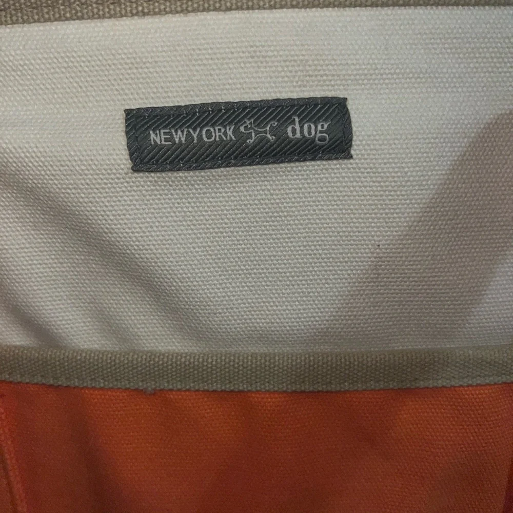 New York dog orange and cream colored dog carrier cold orange small/med